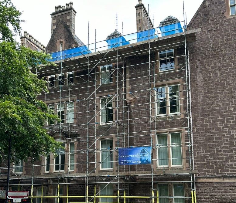 RCR Scaffolding Solutions temporary roof system installed over a residential property in Stirling to provide 100% weather protection.