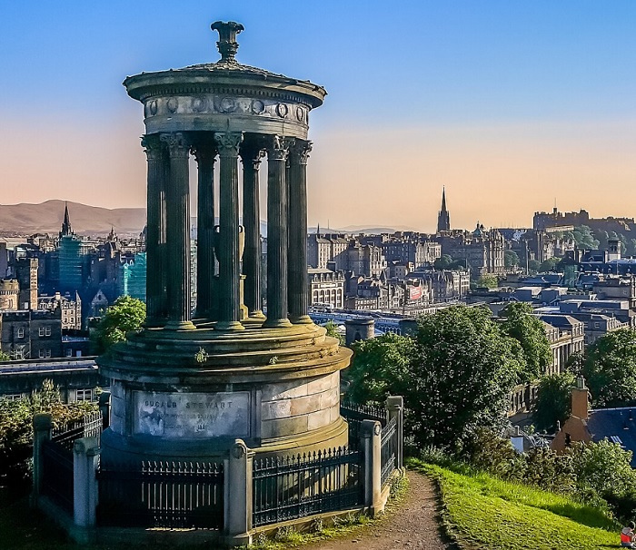 Professional multi-storey tenement scaffolding by RCR Scaffolding Solutions in Edinburgh city center, providing safe access for stone restoration and roof repairs with 40 years of heritage experience and full council permit compliance.