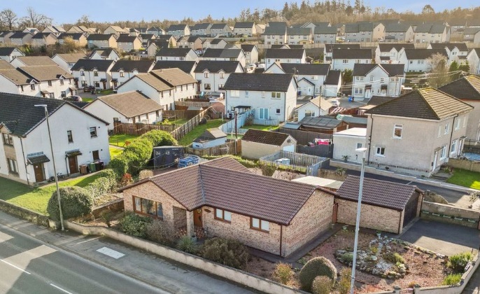 Premium multi-level domestic scaffolding tower erected by RCR Scaffolding Solutions on a traditional stone house in Plean, FK7, providing safe access for multi-storey chimney restoration with 40 years of local experience and CISRS qualified safety.